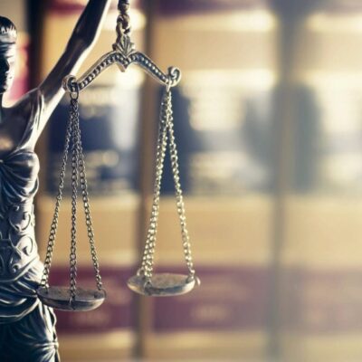 Lady Justice statue with balance scales.