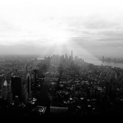 A black and white photo of the skyline of new york city.