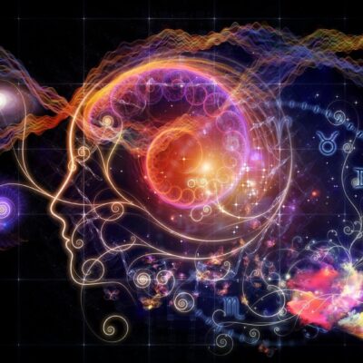 An image of a man's head with astrological symbols on it.