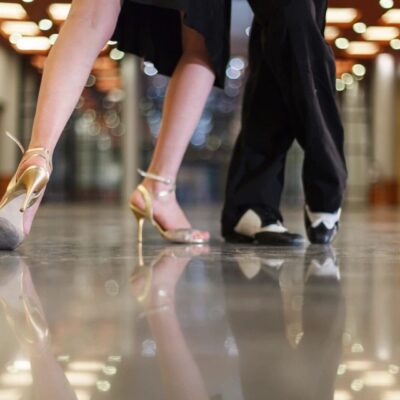 Elegant ballroom dancers' feet and shoes.