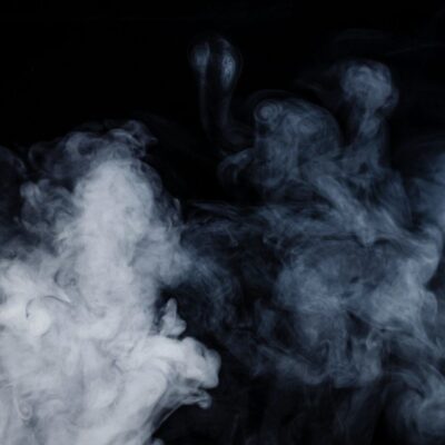 A close up of smoke on a black background.
