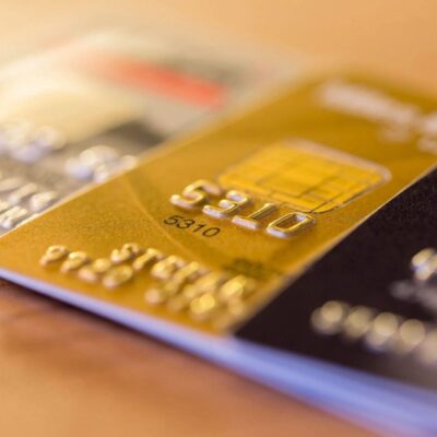 A group of credit cards on a table.