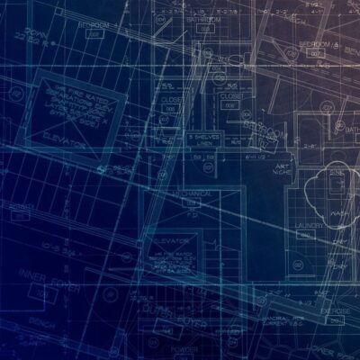 A blueprint of a building on a blue background.